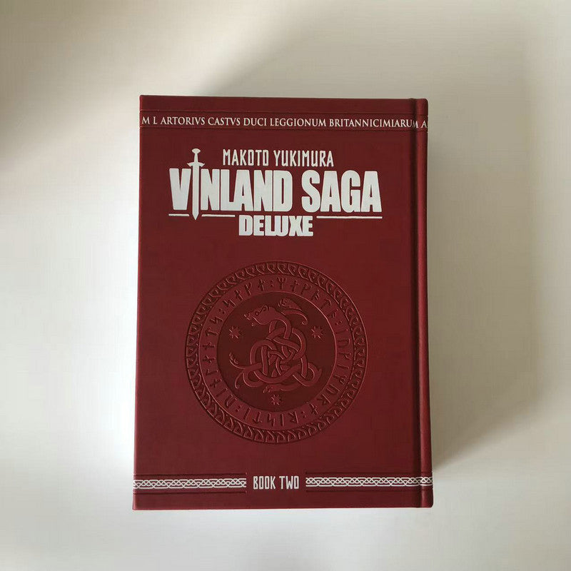 Vinland Saga Deluxe Book Two, red faux-leather hardcover with embossed Viking rune medallion