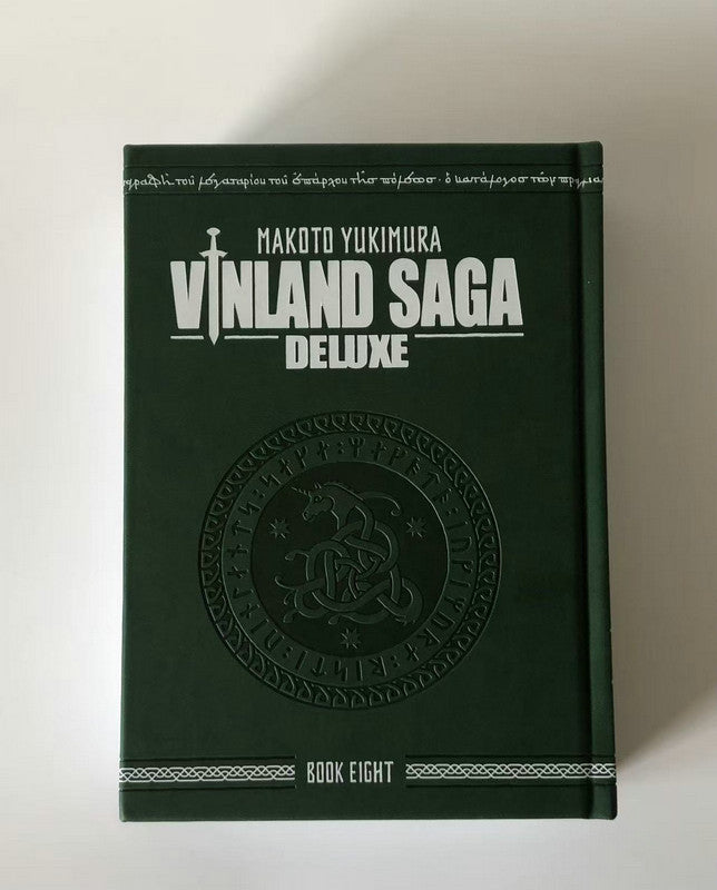 Vinland Saga Deluxe Book Eight, dark green faux-leather hardcover with embossed Viking rune medallion