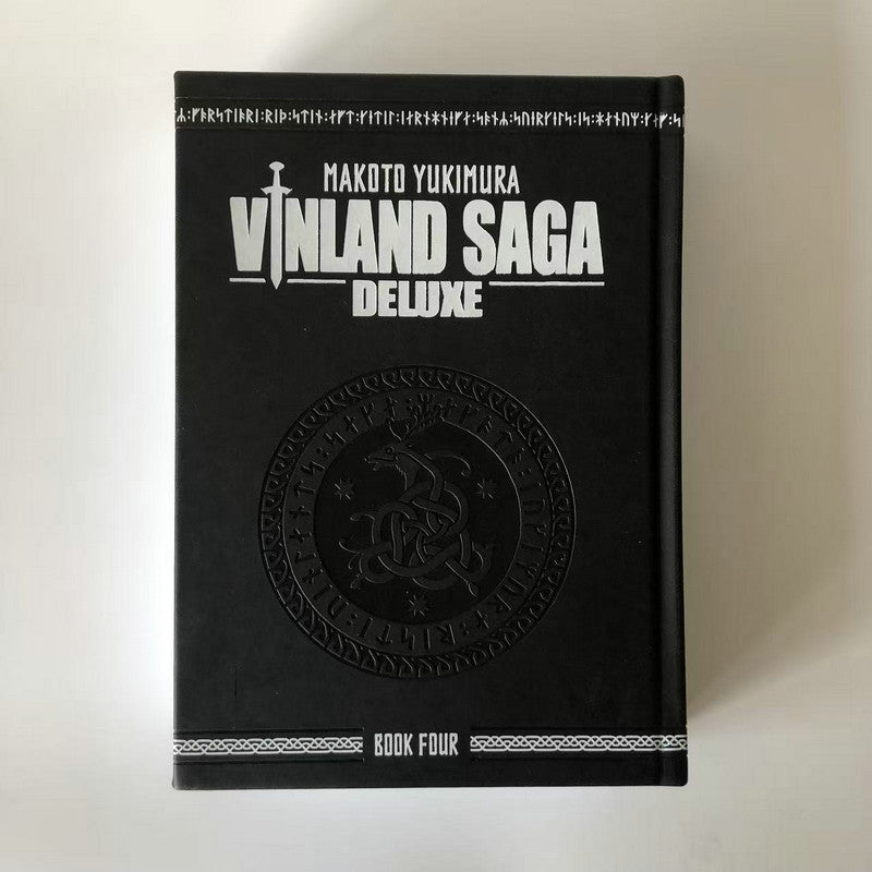 Vinland Saga Deluxe Book Four, black faux-leather hardcover shown front-on