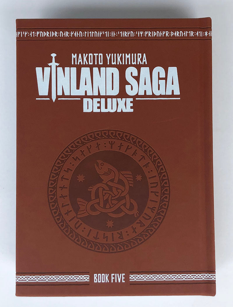 Vinland Saga Deluxe Book Five, rust brown faux-leather hardcover with embossed Viking rune medallion