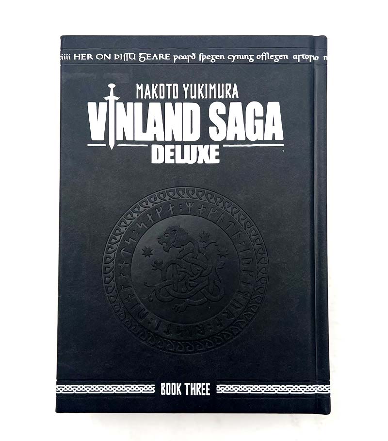 Vinland Saga Deluxe Book Three, navy faux-leather hardcover with embossed Viking rune medallion